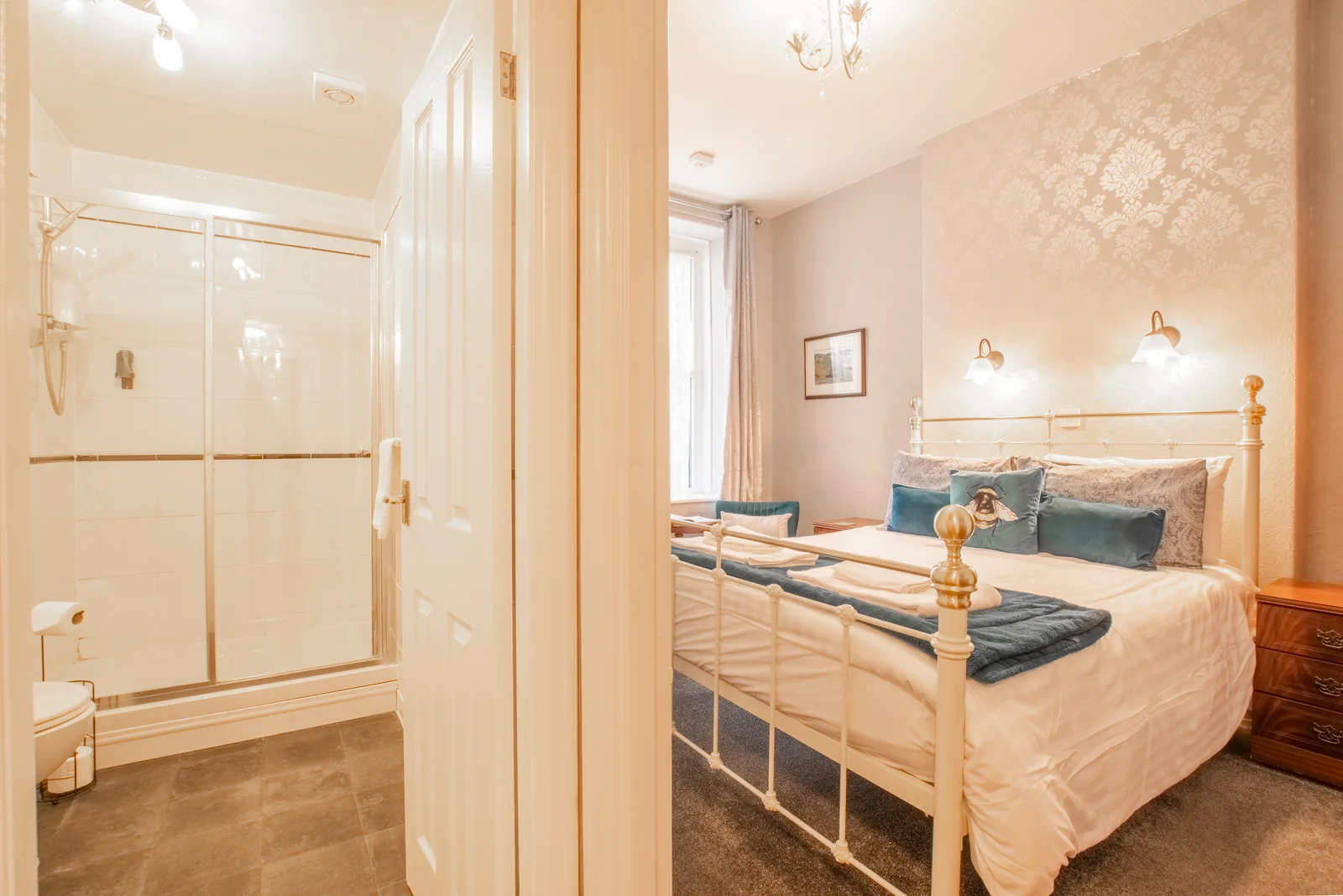 Penrhyn, Room 2: the bedroom with the en-suite shower room through the open door